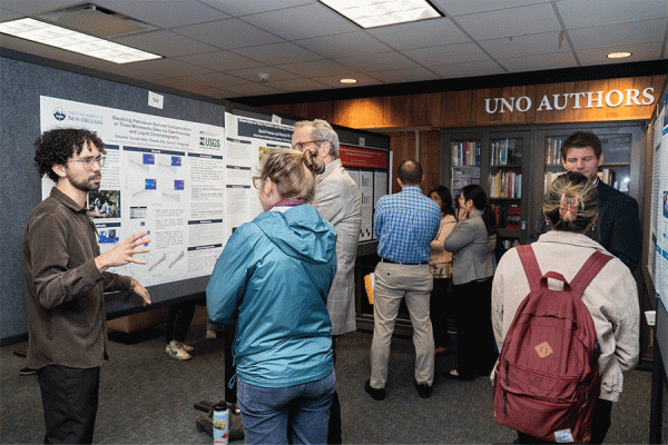 91ֱ graduate student Eduardo Turcios shares research as part of the annual InnovateUNO symposium held on campus Nov. 14-15. 